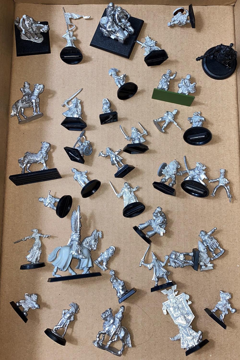 A selection of unpainted vintage Games Workshop Citadel Games, and some others, mainly Warhammer