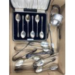 A hallmarked silver set of 6 teaspoons, cased, Birmingham 1929; a pair of hallmarked silver sugar