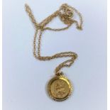 A 9ct gold St Christopher medal and chain, 5.7gm