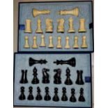 A modern, good quality, Staunton style, carved wooden chess set with weighted bases, height of