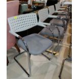 A set of six modern designer LGA Geprufte Sicherheit Vitra chrome and grey molded plastic armchairs
