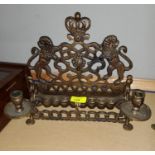 A late 19th early 20th century brass Hanukkah light -Menorah with twin side sconces, lions rampant