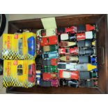 A selection of diecast advertising vehicles including Colemans Mustard etc and four boxed cars
