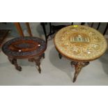 An Eastern occasional table with circular top and extensive inlaid decoration; a small carved '