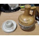 A ceramic match striker by Minton for Bryant & May; a stoneware whisky decanter for Gilmour