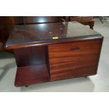 A reproduction mahogany Meredew coffee table with fall front drawer & bookcase section. 60 x 74 x