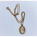 A cameo pendant in 9ct gold mount and unmarked yellow metal chain