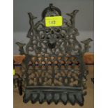 A cast brass wall handing Hanukkah light -Menorah with extensive pierced decoration height 32cm