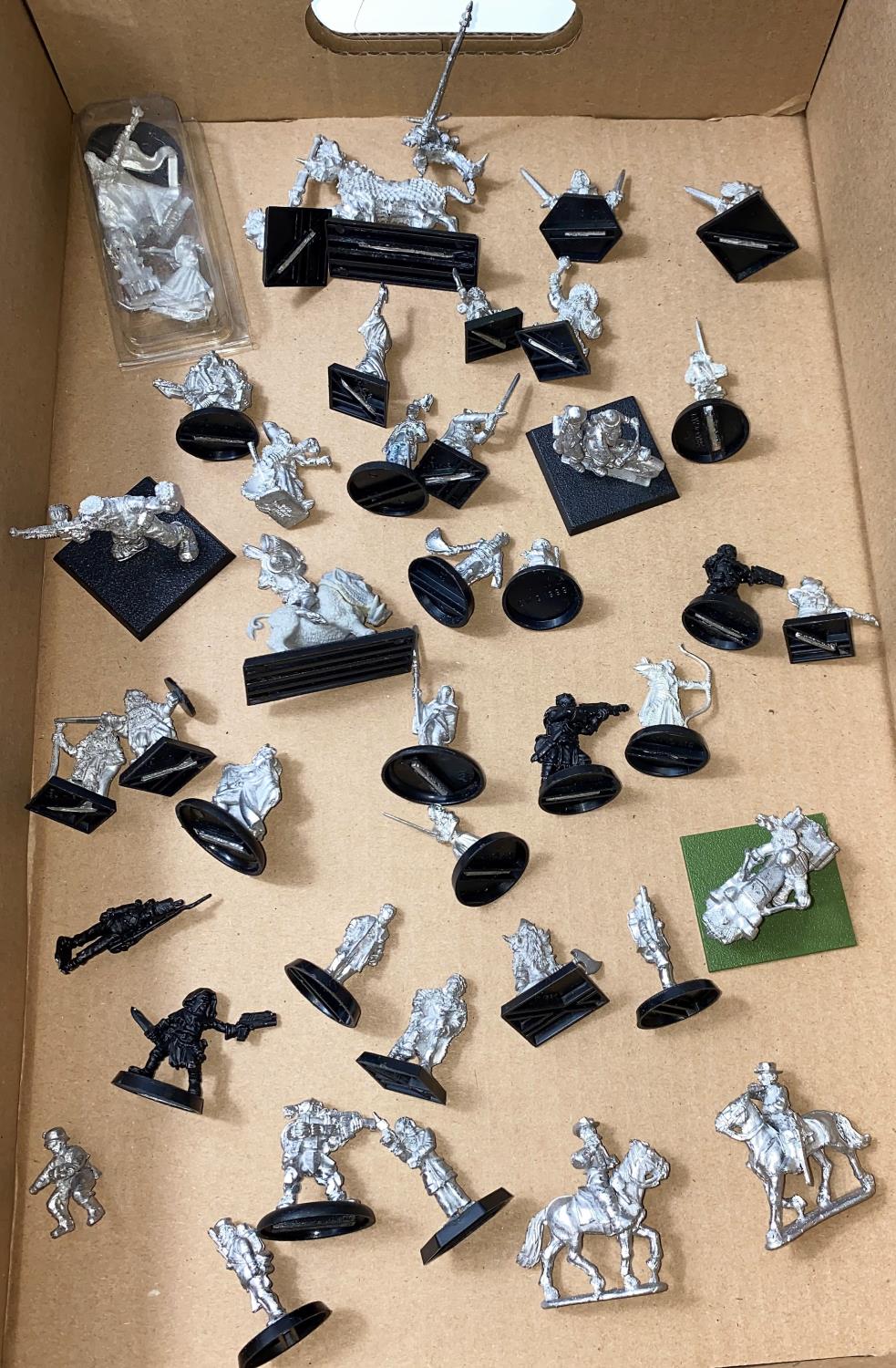 A selection of unpainted vintage Games Workshop Citadel Games, and some others, mainly Warhammer