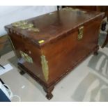 An impressive reproduction continental style chest with hinged lid with large brass hinges,
