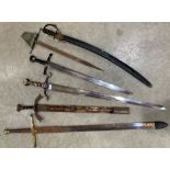 Five re-enactment swords and a cutlass