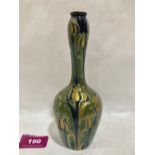 A MacIntyre Moorcroft Florian Ware Art-Nouveau vase, decorated in the Green and Gold pattern with