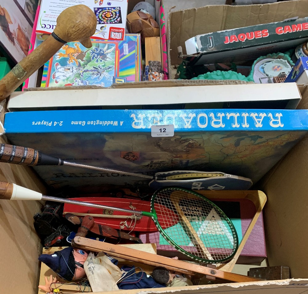 A box of vintage toys and games
