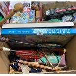 A box of vintage toys and games