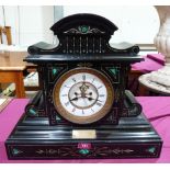 A 19th century French slate and malachite cased mantle clock, the dial with Brocot escapement.