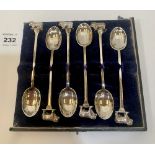 A cased set of six George V silver teaspoons with cast bull Terminals. Sheffield 1917. 3ozs 11 dwts.