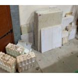 A quantity of stone floor tiles to include some Mandarin Stone Company