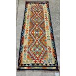 A Choli Kilim runner. 1.94m x 0.72m