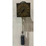 An early 18th century hook and spike wall clock, the 8' square brass dial with Roman chapter,