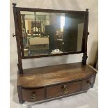 A George III mahogany bow-breakfront dressing table mirror with three drawers 23' wide