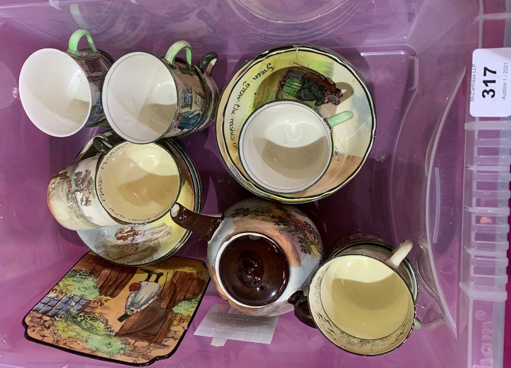 A collection of Royal Doulton Dickens Ware teaware. (Teapot cover chipped; one cup hairline cracked;