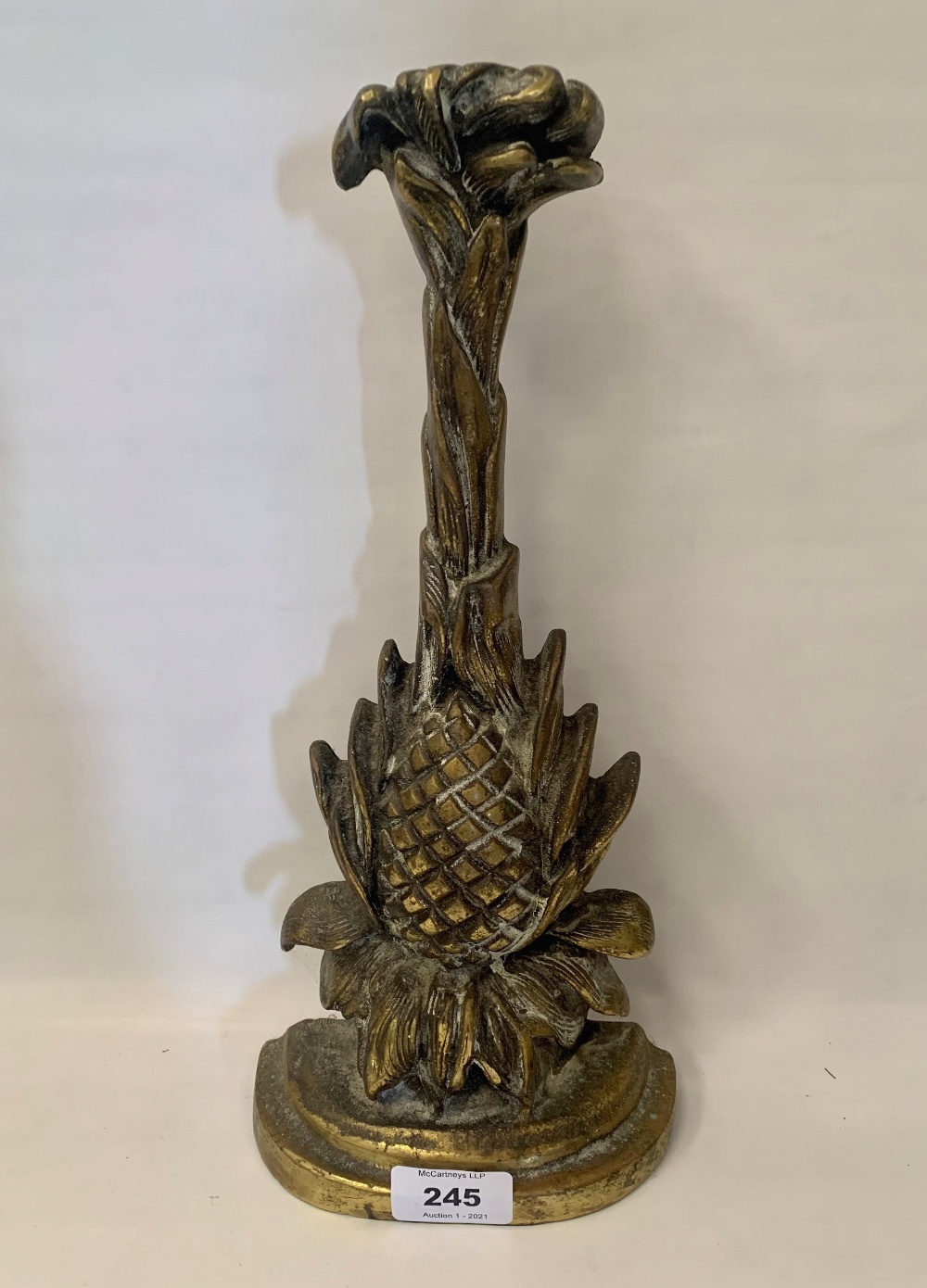 A Victorian brass doorstop cast as a pineapple. 13' high