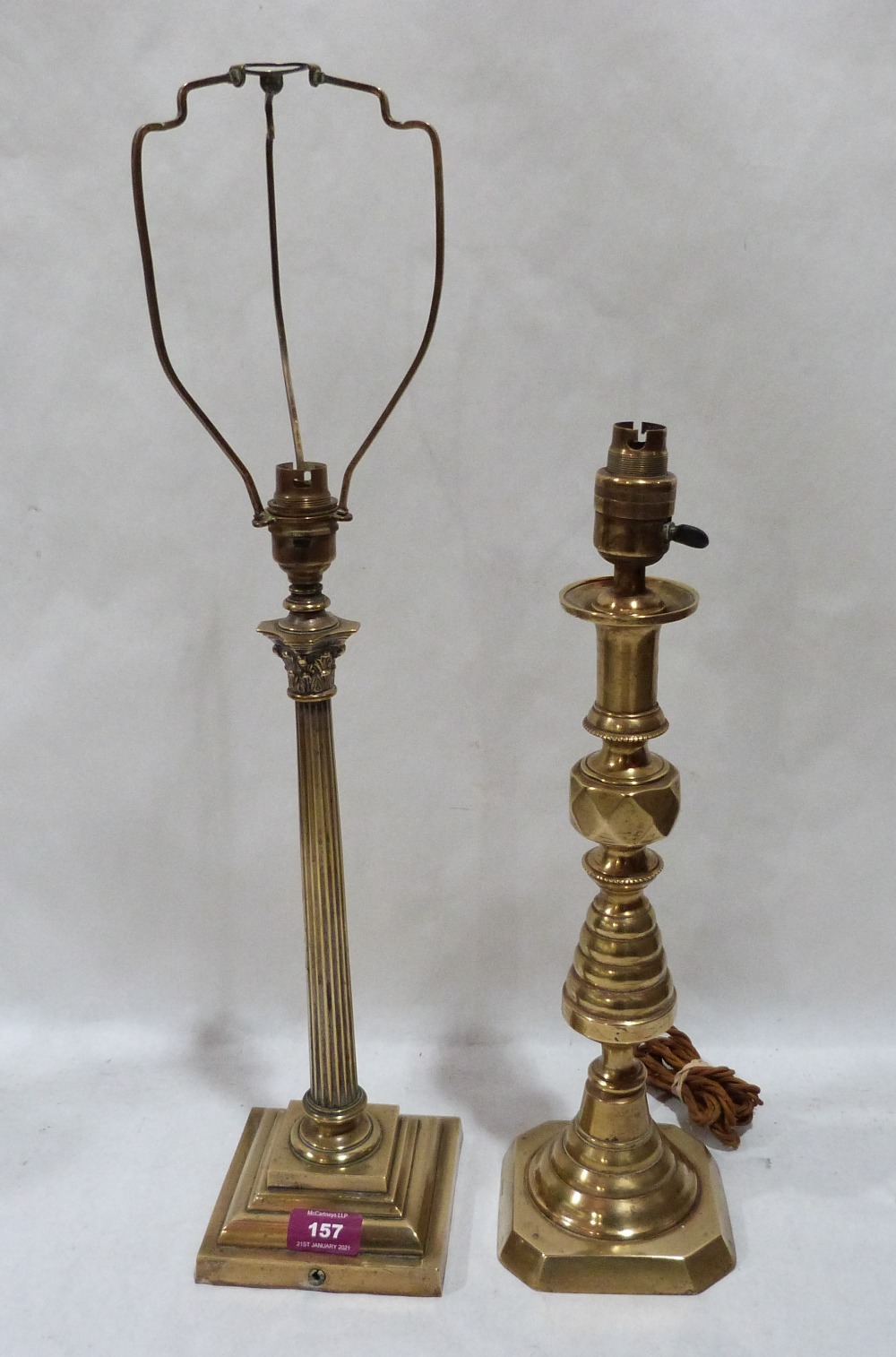 A brass Corinthian column table lamp, 16' high; together with a turned brass table lamp. 17' high