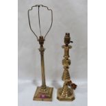 A brass Corinthian column table lamp, 16' high; together with a turned brass table lamp. 17' high