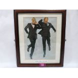 Popular Culture. Morcambe and Wise. A signed photograph. Framed