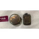 A silver vesta case and a white metal pill box