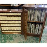 A mahogany cabinet with a large number of classical vinyl records together with a bookcase of
