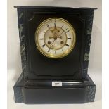 A French slate and marble mantle clock, with brass drum movement striking on a bell, the dial with