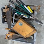 A large quantity of woodworking and garden tools