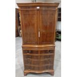 A yew veneered cabinet on chest of recent manufacture. 60' high