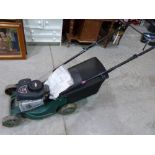 A Atco Briggs and Stratton petrol lawnmower