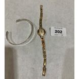 An Accurist 9ct cased lady's wristwatch with rolled gold bracelet, together with a silver