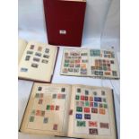 Four albums of postage stamps together with loose and mounted stamps