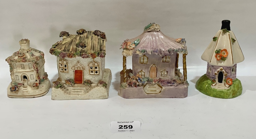 Four 19th century Staffordshire cottages or pastille burners