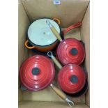 A box of Cousances cast iron cookware, the lot to include a Le Creuset cooking pot and cover