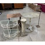 An iron based garden table; a Singer sewing machine stand; a two tier plant table; a brass stand and