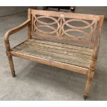 A hardwood garden seat. 44' long