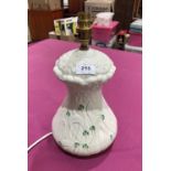 A Belleek table lamp decorated with shamrocks. 10½' high