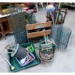 A Black and Decker Workmate, sundry garden tools and netting