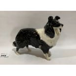 A Beswick gloss glazed sheep dog. 7' long