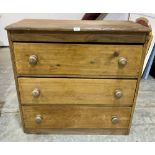A pine chest of three long drawers. 36' wide