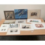 A collection of unframed etchings and watercolour drawings