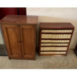 A mahogany record cabinet and a bookcase with a set of Encyclopaedia Britannica volumes