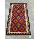 A Maimana Kilim rug. 1.38m x 0.83m