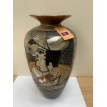 An enamelled inverted baluster vase with decoration in the style of Picasso. 22' high