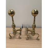 A pair of brass andirons. 18' high